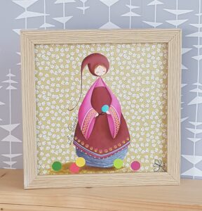 Peinture sur papier décor de Nadine Lefeuve représentant son petit personnage appelé Poupir qui découpe des ronds de papiers